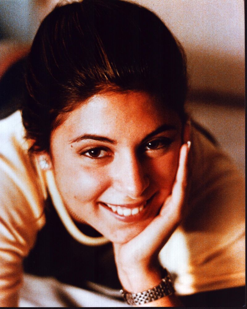 Jamie-Lynn Sigler photo print with head on hand, elegant portrait.