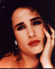 Andie Macdowell close-up photo print with hand on face.