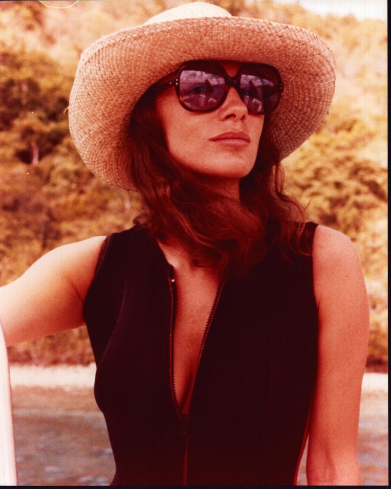 Jacqueline Bisset wearing a straw hat and sunglasses photo print