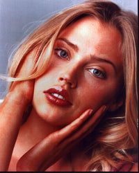 Estella Warren close-up photo print with hands by face.