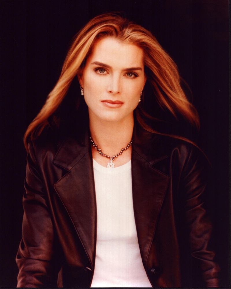 Photo print of Brooke Shields in leather jacket and white top, stylish and iconic.