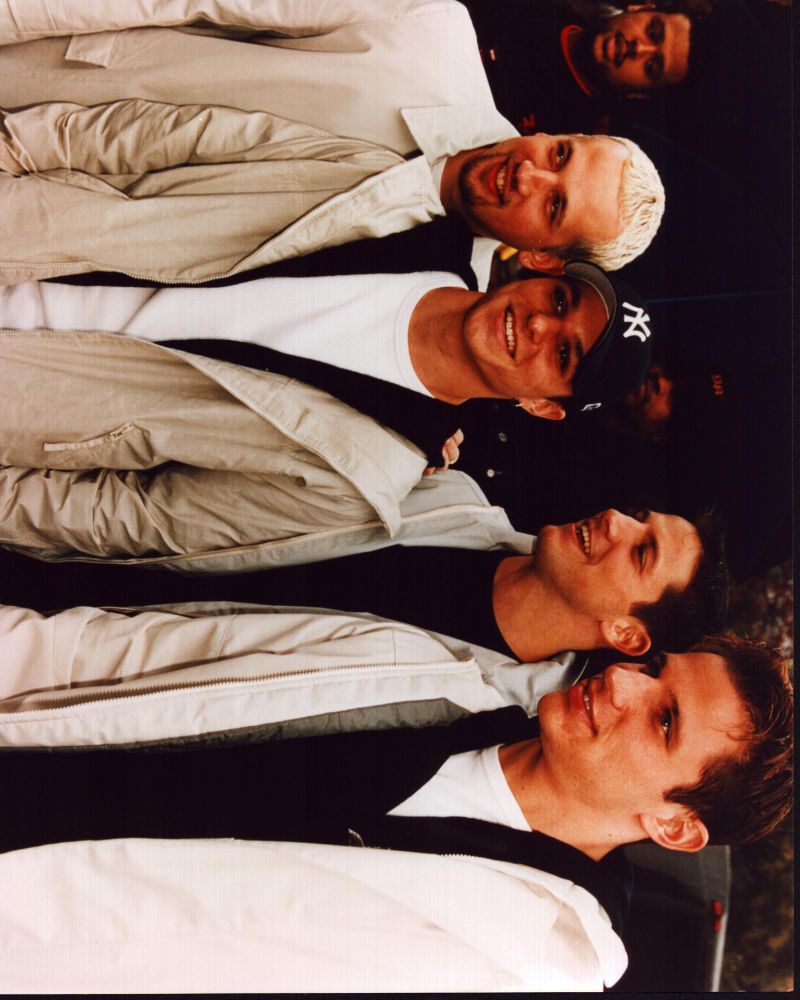 98 Degrees In Tan Jacket Photo Print showcasing the iconic boy band.