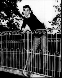 Audrey Hepburn leaning on bridge black and white photo print