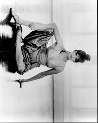 Jaclyn Smith black and white photo print sitting on floor with knee up