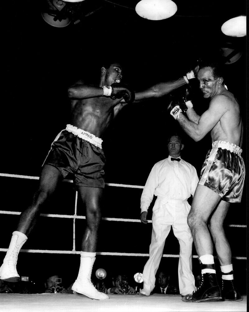 Muhammad Ali fighting Henry Cooper black and white photo print