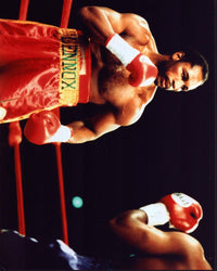 Lennox Lewis boxing action photo print showcasing the champion in the ring.