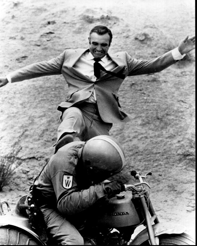 Sean Connery kicking a man off a motorcycle in Diamonds Are Forever black and white photo print