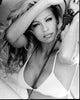 Black and white photo print of Pamela Anderson in bikini top