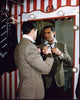Cary Grant photo print tying tie in mirror, classic Hollywood decor