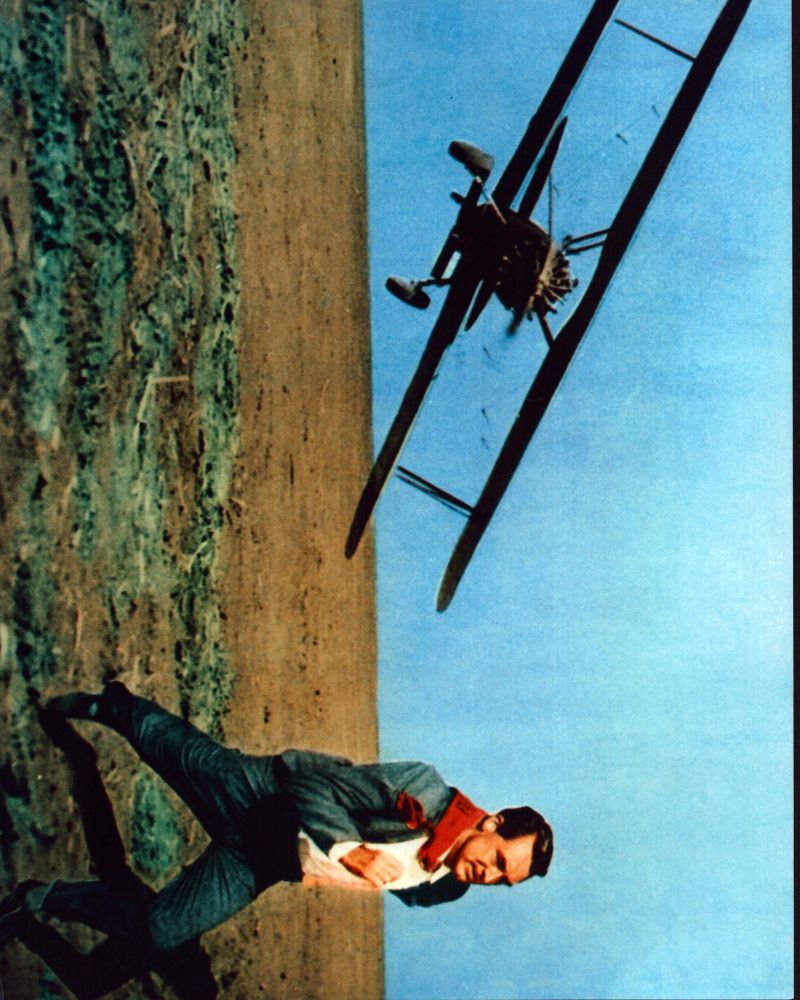 Cary Grant running from a plane in North by Northwest photo print.