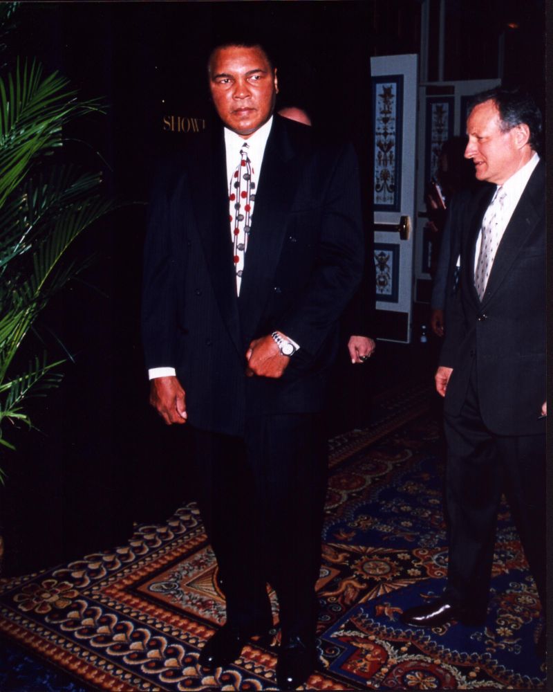 Muhammad Ali photo print in a suit with a patterned tie