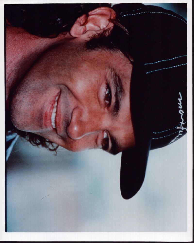 Antonio Banderas smiling close up photo print in black hat.