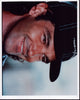 Antonio Banderas smiling close up photo print in black hat.