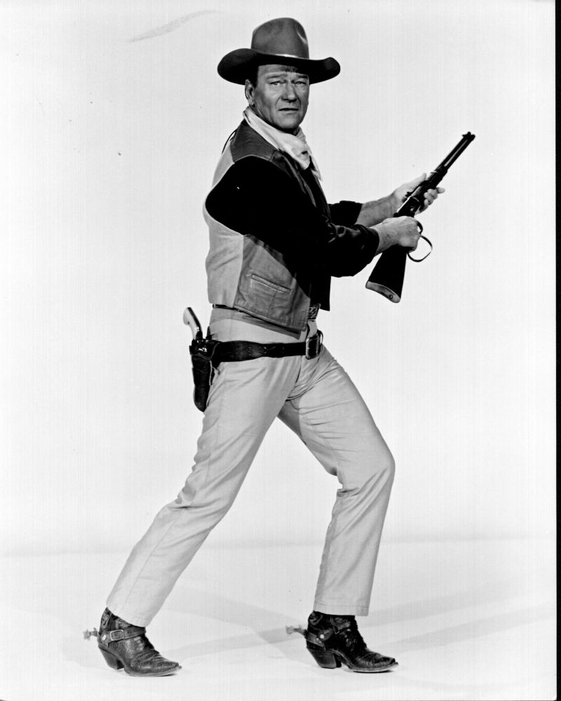John Wayne posed with gun in El Dorado black and white photo print.