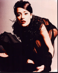 Salma Hayek in black sheer outfit with feathers photo print