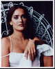 Salma Hayek sitting in a white metal chair photo print