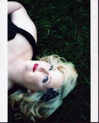 Katrina Parker Laying in Grass Photo Print, serene nature photography.