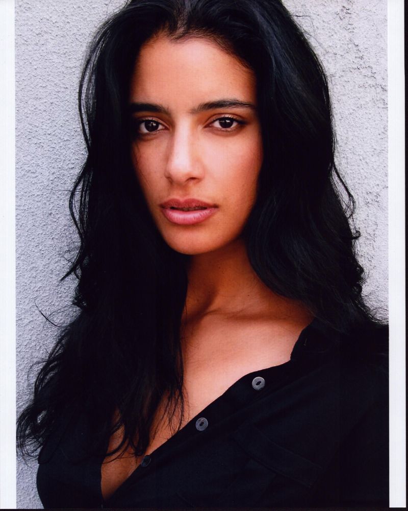 Jessica Clark headshot photo print in a black top.
