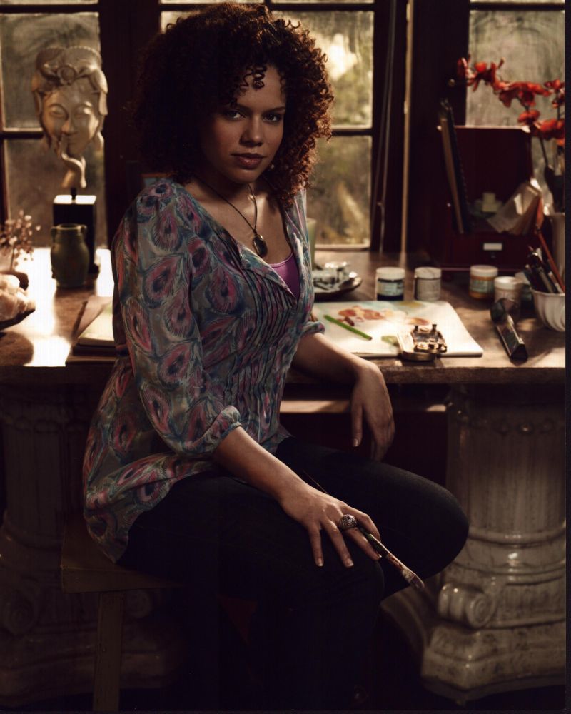 Genelle Williams Sitting at Desk Photo Print from Warehouse 13