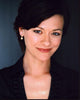 Maribeth Monroe headshot photo print in black checkered top.