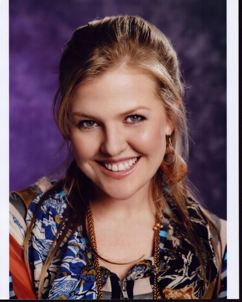 Ashley Jensen vibrant headshot photo print in multi-colored top