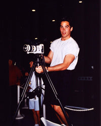 Dean Cain photo print featuring camera on tripod, perfect for decor.