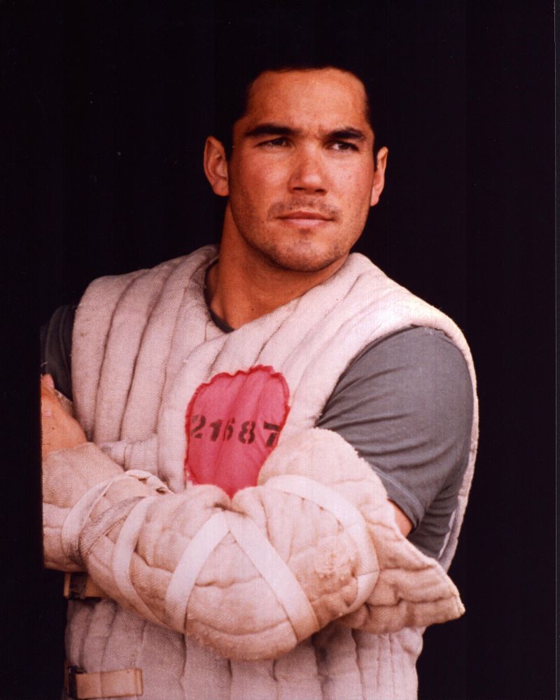 Dean Cain wearing a padded suit photo print.