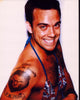 Robbie Williams photo print wearing a beaded bikini top