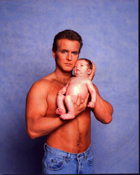 Doug Davidson Shirtless With Baby Photo Print, showcasing a touching moment with a baby.