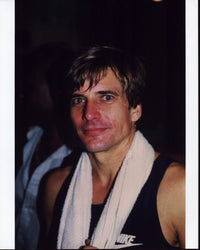 Dirk Benedict in tank top with towel around neck photo print