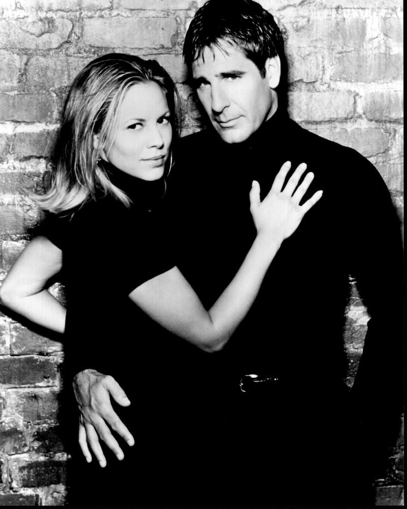 Mr. & Mrs. Smith photo print featuring Maria Bello and Scott Bakula.