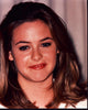 Alicia Silverstone close-up photo print, vibrant colors, high detail.