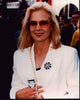 Photo print of Sylvie Vartan in a white suit and sunglasses