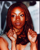 Brandy close-up photo print with hands by face in gray top.