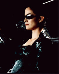 Carrie-Anne Moss in The Matrix - Photo Print featuring Trinity inside a car
