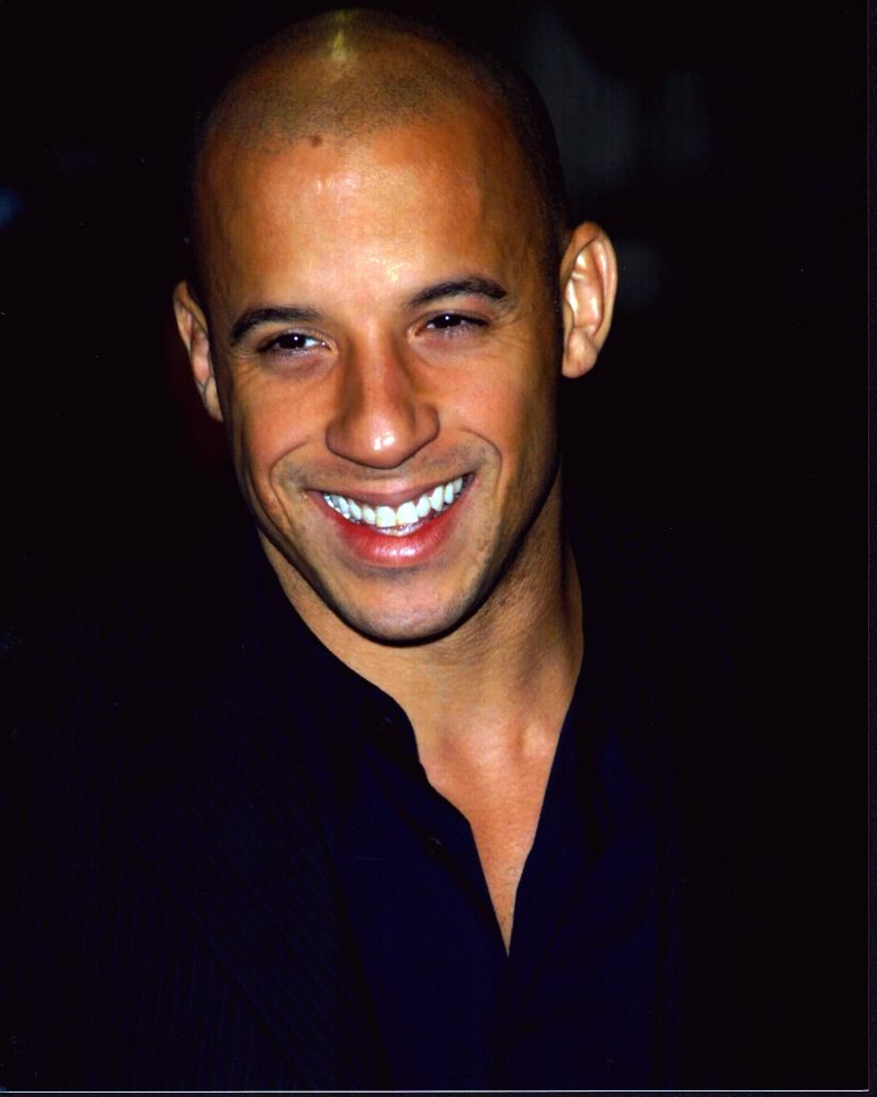 Vin Diesel smiling photo print capturing a joyful moment.