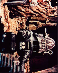 Robby The Robot in Forbidden Planet Photo Print showcasing classic sci-fi character.