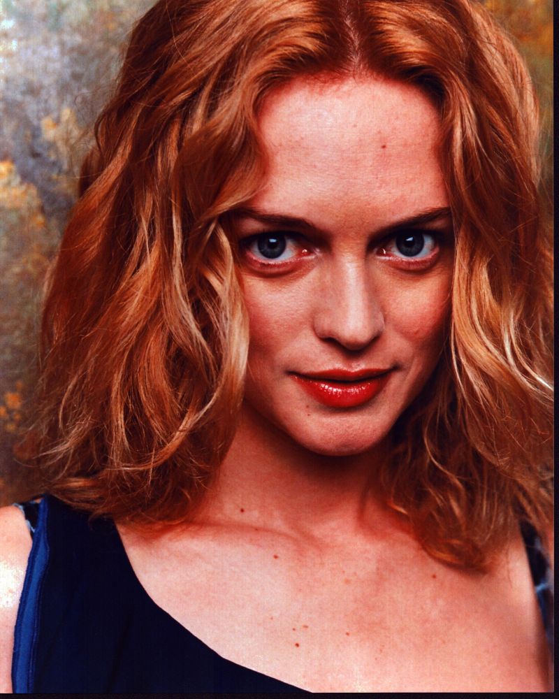 Close-up photo print of Heather Graham in a blue tank top.