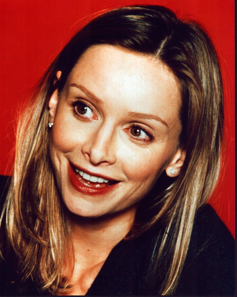 Calista Flockhart photo print in black top with red background