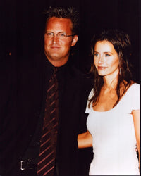 Matthew Perry and Courteney Cox Photo Print capturing iconic TV moment.