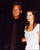 Matthew Perry and Courteney Cox Photo Print capturing iconic TV moment.