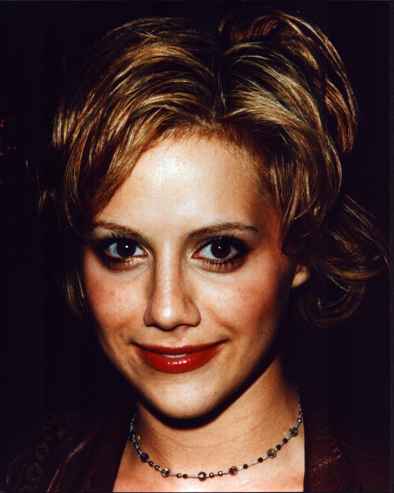 Brittany Murphy close-up photo print featuring a beaded necklace.