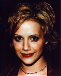 Brittany Murphy close-up photo print featuring a beaded necklace.