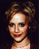 Brittany Murphy close-up photo print featuring a beaded necklace.