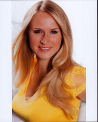 Jenn Gotzon headshot photo print in yellow shirt.