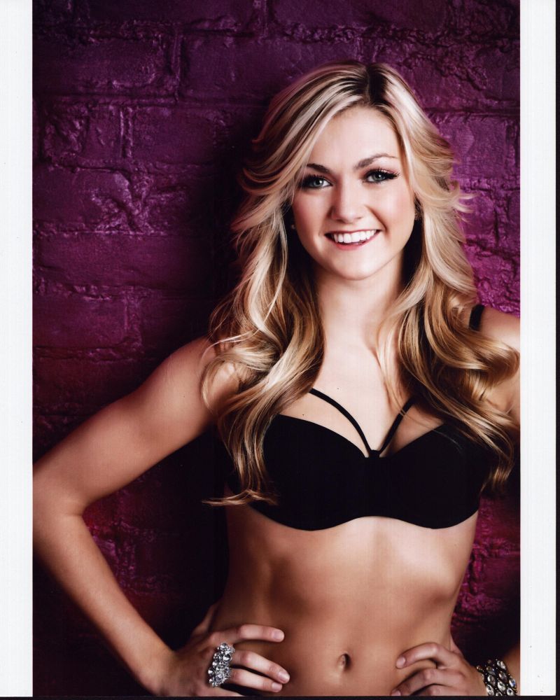 Lindsay Arnold photo print in black bra with hands on hips pose.