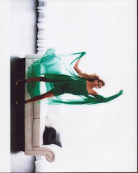Lindsay Arnold photo print in a green flowing dress