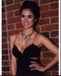 Diane Guerrero photo print in black cut out dress, elegant and stylish.