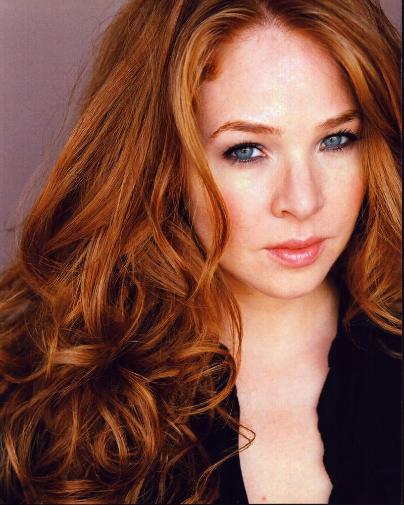 Trisha Lafache headshot photo print in black top, elegant wall art.