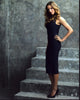 Katie Cassidy posing in a black dress on steps - photo print